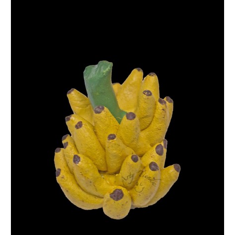 Plátano en racimo en cerámica cocida