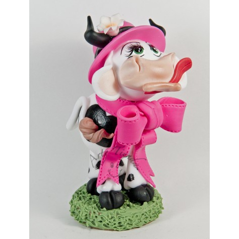 Vaca parada con moño en porcelanicron