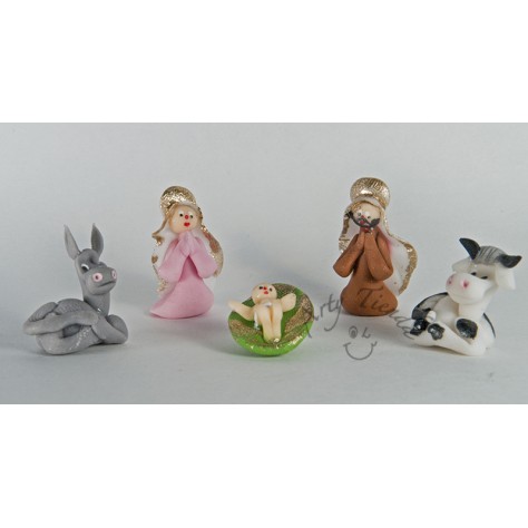 Nacimiento en porcelanicron miniatura por 5 figuras